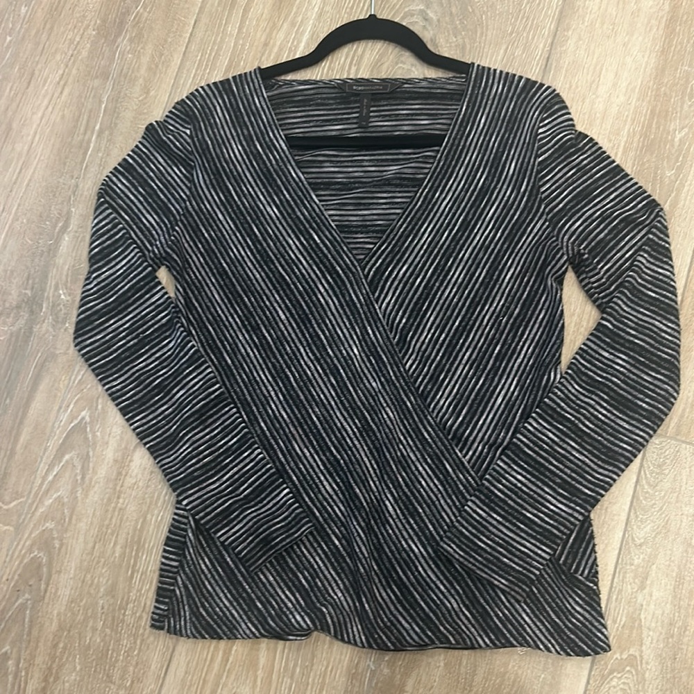 Knit v neck, attached front crossover detail. Black, grey,white thin stripes